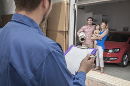 Careful piano transport through a central London property entrance