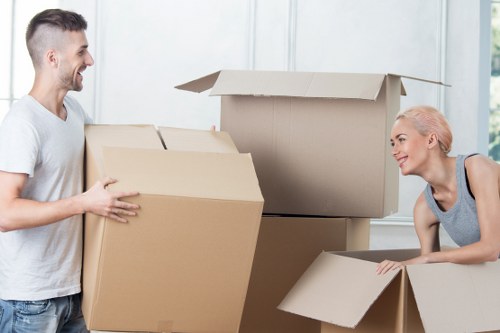 Furniture being carried carefully down stairs during a flat removal