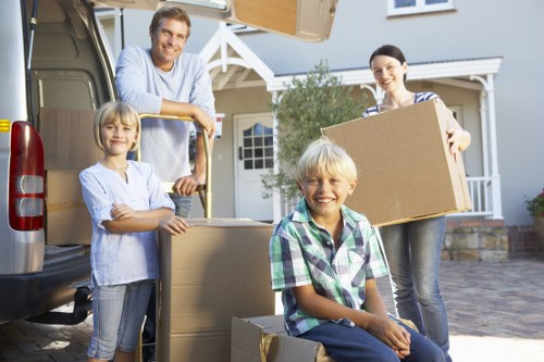 Removal van loading household items with care