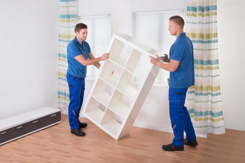 Household furniture being carried during Bayswater removals