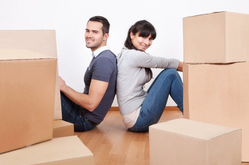 Packed moving boxes and furniture ready for transport in Bayswater